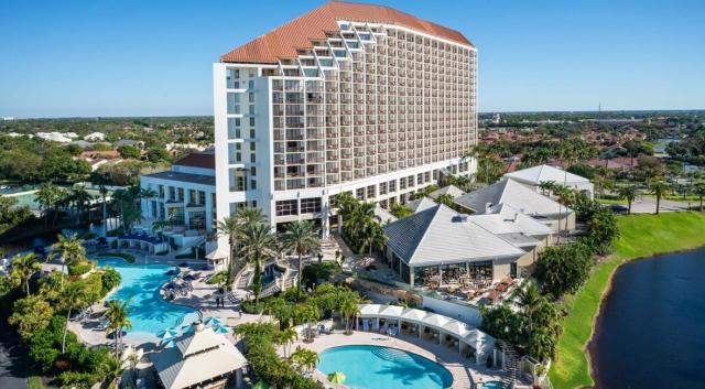 Naples Grande Beach Resort exterior shot with pool